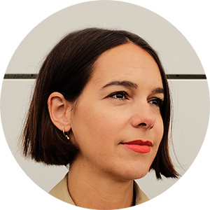 Mango Kollektiv | Headshot of co-founder and author Claudia